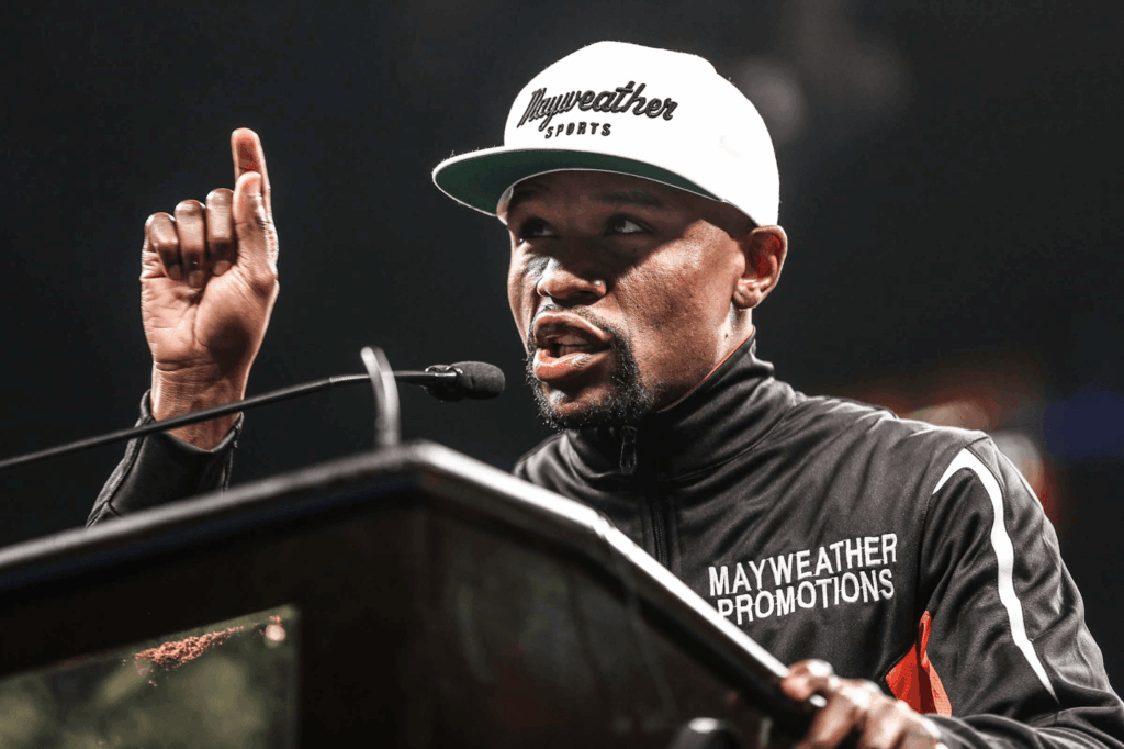 Floyd Mayweather Jr. speaking at podium