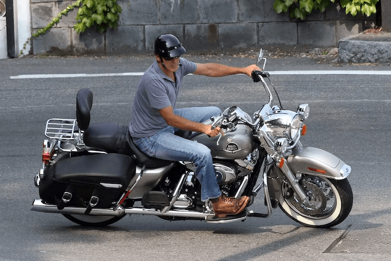 George Clooney on motorcycle